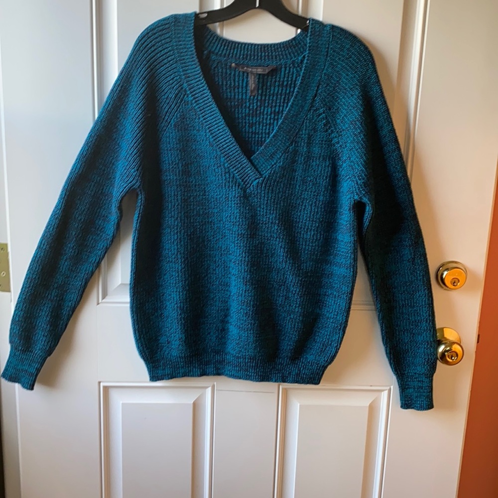 “ BCBG MAXAZRIA” Woman’s sweater with a v-neck